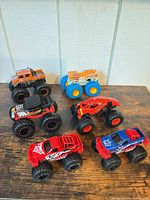 Group shot of all six monster trucks