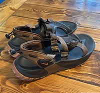 Pair of Nike sport sandals side view showing color and sole