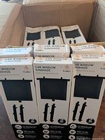 Front view of boxed EcoNour Car Window Sunshades inside shipping carton