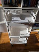 Fully assembled example of the three-tier Goovilla cart showing design, trays and casters