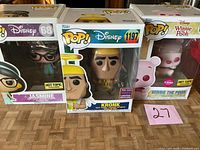 Front view showing three boxed Funko Pop! figures: Jasmine #68, Kronk #1197, Flocked Winnie the Pooh