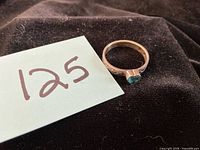 Ring top view showing heart stone and band