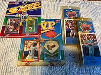 Group shot of all four blister-pack items including two Topps Baseball Talk cards and two Ace MVP packs