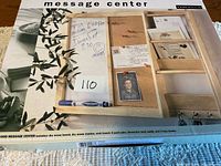 Front of sealed box showing product image and contents list