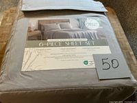Front of packaged sheet set showing brand, size and contents