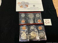 Full set with envelope and both sealed coin packs