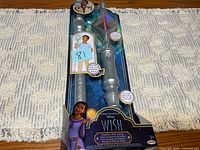 Front of packaged Disney Wish Magnifico's Mystical Staff toy