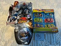 All three packaged toys displayed together