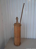Full view of butter churn with lid and dasher