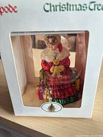 Front view of ornament inside original Spode Christmas Tree packaging