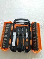 open case showing knife handles and blade racks