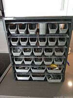 Front view of Husky organizer with 28 drawers filled with hardware