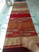 Full view of Thai silk runner on glass table