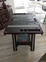 Full view of Worx Pegasus table assembled showing top surface, legs and clamp storage