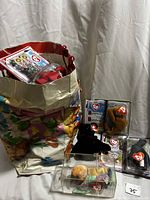 Overview of gift bag and Beanie Babies in cases