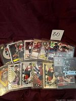 Group shot showing all Eric Lindros cards in sleeves, mixture of designs and brands