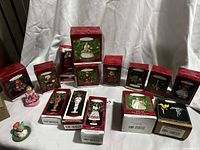 Group shot of all boxed ornaments and two loose pieces