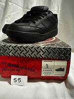 shoes on top of original box showing size label on box