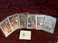 All six Scottie Pippen cards in top loaders