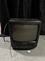 Front view of Durabrand CRT TV/VCR combo showing screen, VHS slot and controls