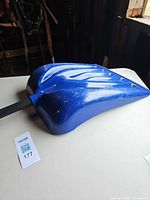 Overall view of blue plastic shovel scoop