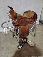 Full view of saddle on stand showing overall construction and color