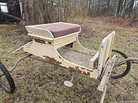 Left side view showing full cart, four wheels, shafts, body condition