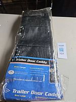 Packaged Professional's Choice trailer door caddy on table