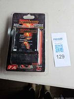 Front of sealed package showing controller and branding