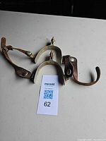 Full view of both spurs showing metal, straps and overall condition