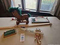 overview showing pull toy horse and assorted plaques