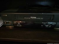 Front view of the Sanyo VHR-5435 VCR showing tape slot, control panel and front composite jacks