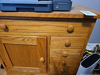 front view showing door, drawers and knob details