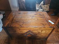 Closed view showing top, front, finish and hinges