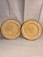 front view showing both rooster plates