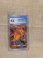 Front of CGC slabbed Charizard GX card showing grade