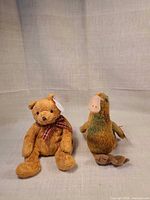 Front view of both plush toys showing overall appearance and size