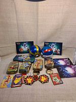 Lot overview showing all tins, Poké Balls, cards and coins