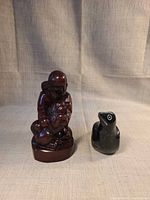 Front view of both carvings side by side