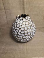 Front view of the vase showing overall shape and texture