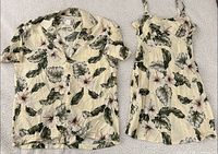 Shirt and dress laid flat showing overall design and condition