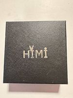 Front of black HIMI gift box