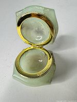 Jar open showing interior and hinge