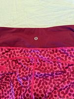 Close-up of waistband logo and fabric pattern