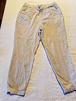 Full view of beige joggers front