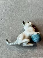 Full view of porcelain cat figurine
