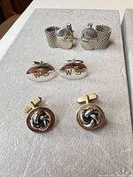 Front view showing all three cufflink pairs