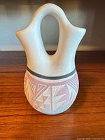 Front view showing overall form and decoration of vase