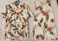 Full view of matching shirt and dress laid flat