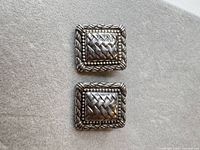 front view showing both rectangular earrings and design details